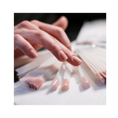 A close-up of a person's natural nail elegantly being prepared for gel manicure at home